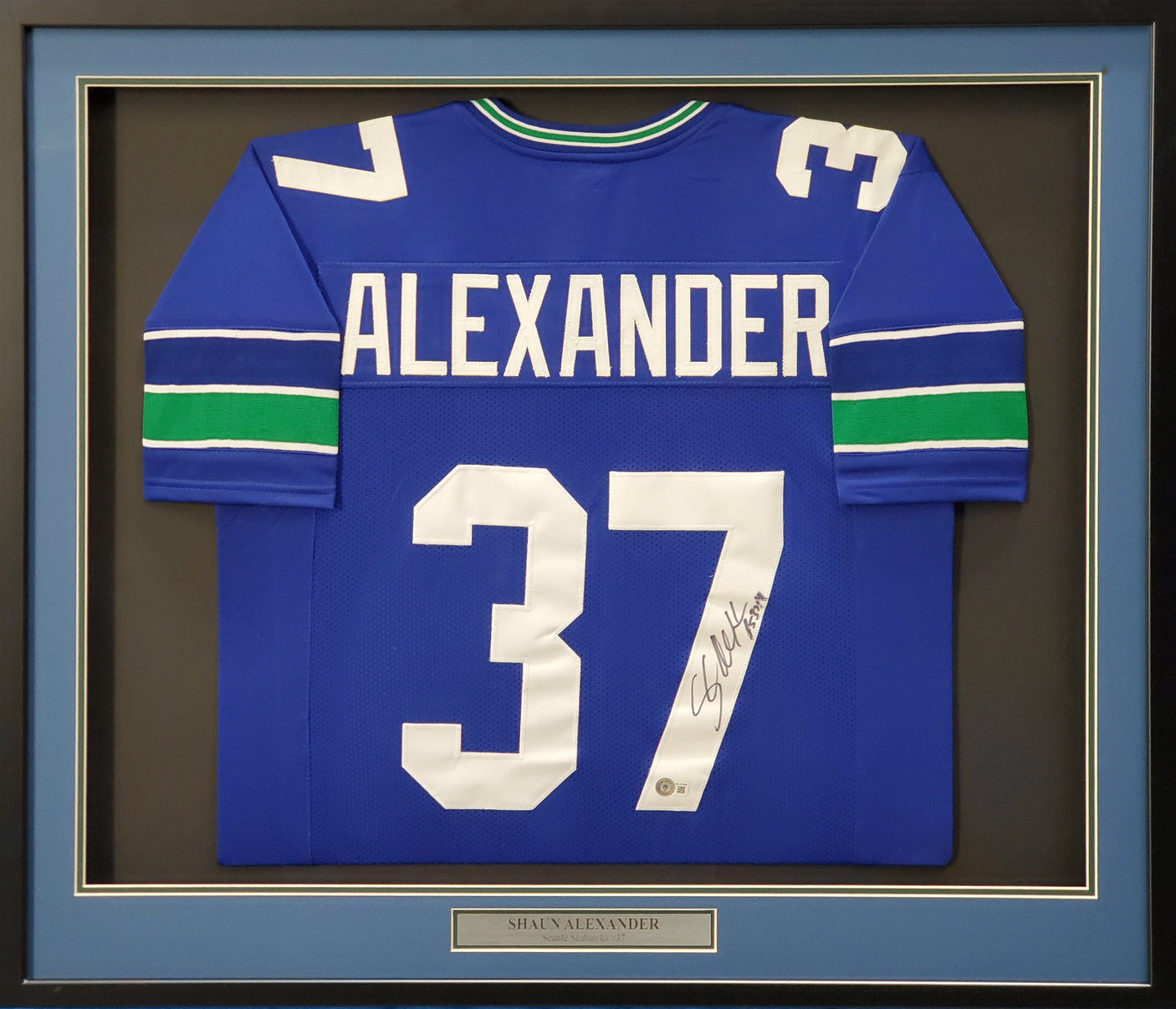 Seattle Seahawks Shaun Alexander Autographed Framed Blue Jersey Beckett BAS Stock #200433