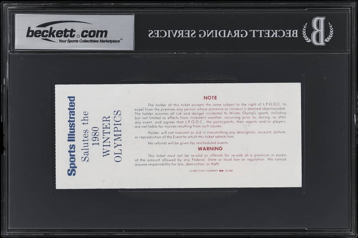 A 1980 USA Hockey vs. West Germany game ticket from February 20, signed by 20 team members and graded BAS Auto 10, encased by Sports Integrity with a liability note and blue/red text on a white background.