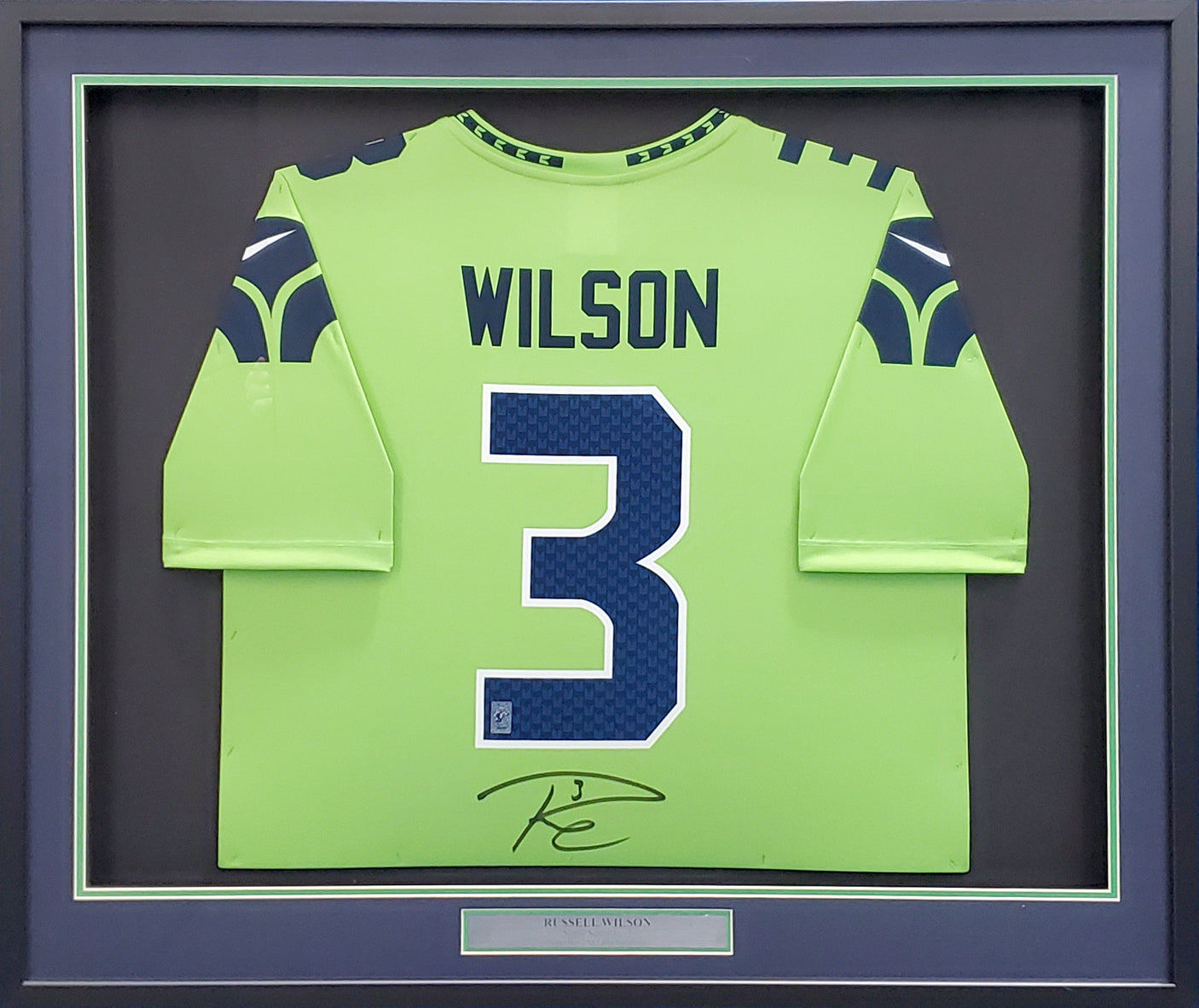 Seattle Seahawks Russell Wilson Autographed Action Green Nike Framed Jersey RW Holo Stock #185764