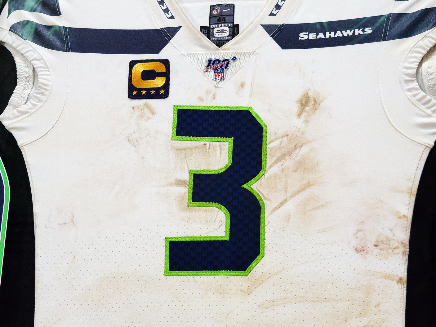 Russell Wilson Framed Game Used Seattle Seahawks White Nike Jersey With Captain's Patch & NFL 100 Logo Unsigned SKU #203517