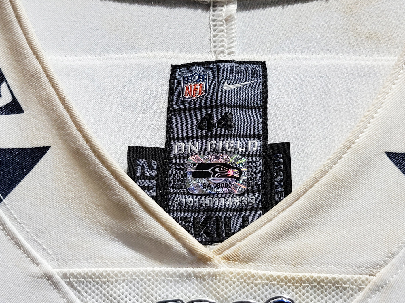 Russell Wilson Framed Game Used Seattle Seahawks White Nike Jersey With Captain's Patch & NFL 100 Logo Unsigned SKU #203517