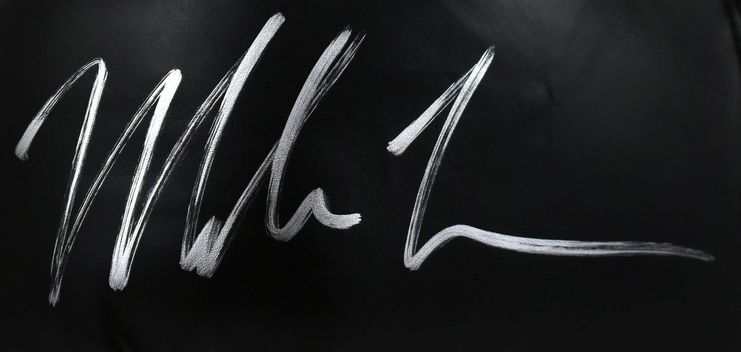 Mike Tyson Autographed Black Everlast Boxing Glove- Beckett W Hologram *Left