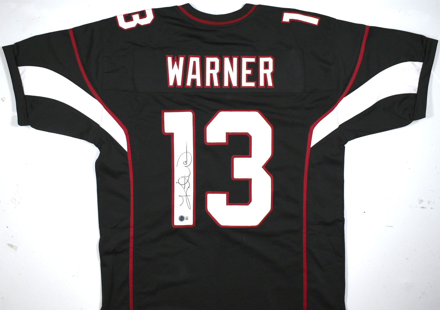 Kurt Warner Autographed Black Pro Style Jersey - Beckett W Hologram *Black