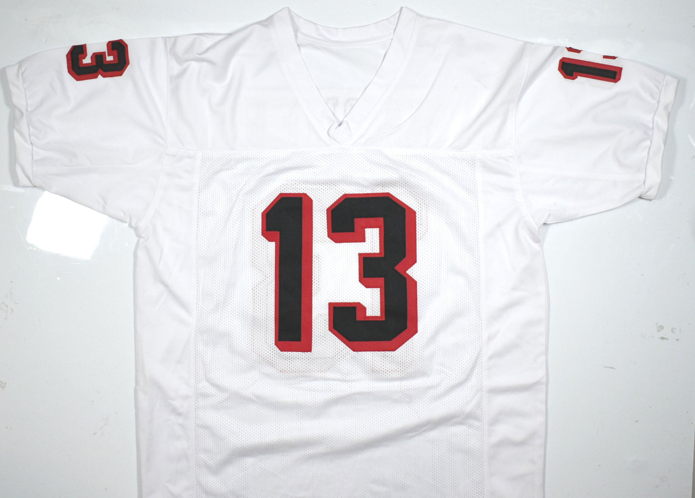 Kurt Warner Autographed White Pro Style Jersey-Beckett W Hologram *Silver