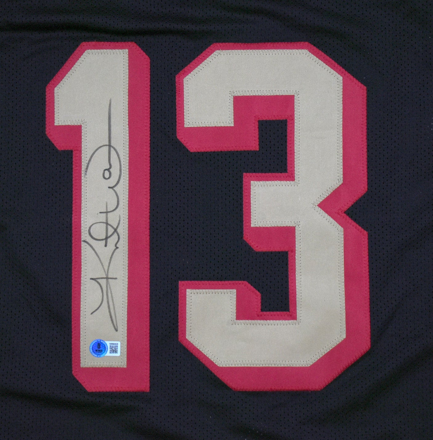 Kurt Warner Autographed Black Pro Style Jersey-Beckett W Hologram *Black