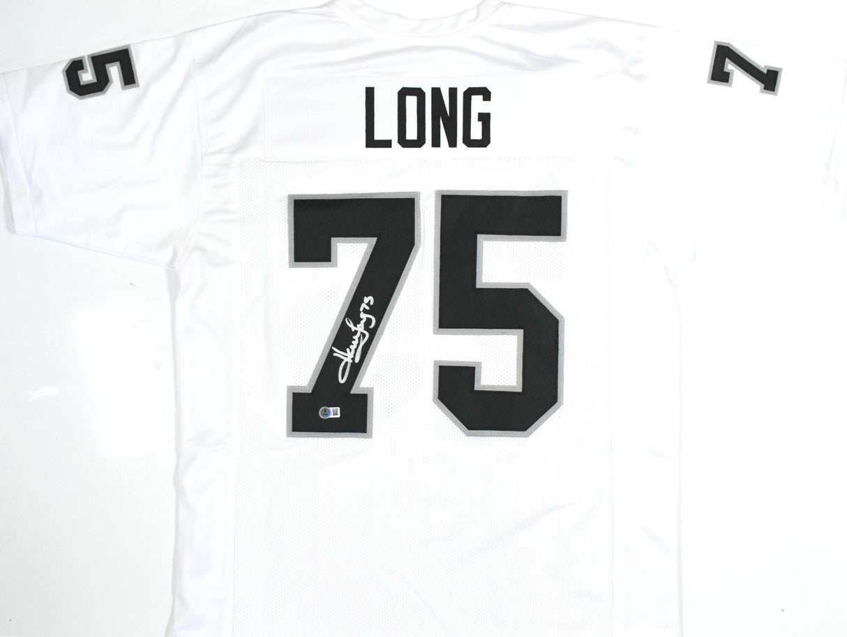 Howie Long Autographed White Pro Style Jersey - Beckett W Hologram *Silver