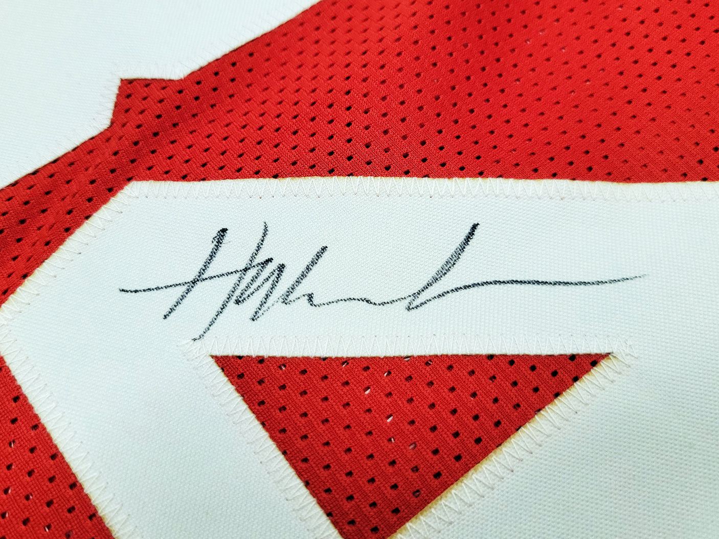 Houston Rockets Hakeem Olajuwon Autographed Red Jersey The Dream JSA Stock #202338