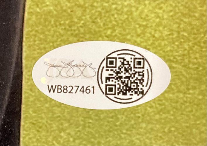A Bo Nickal Signed 8x10 UFC Photo with Donald Trump by Sports Integrity features a white oval JSA ITP sticker (with QR code and serial number WB827461) on a green background.