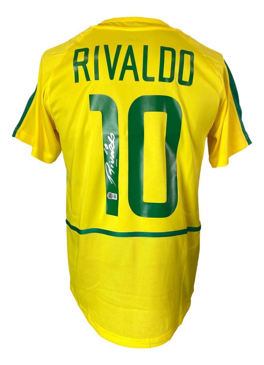 Sports Integrity's Rivaldo Signed Brazil Nike Soccer Jersey features a yellow design with green accents, Rivaldo's name, number 10 on the back, and a white signature on the number.