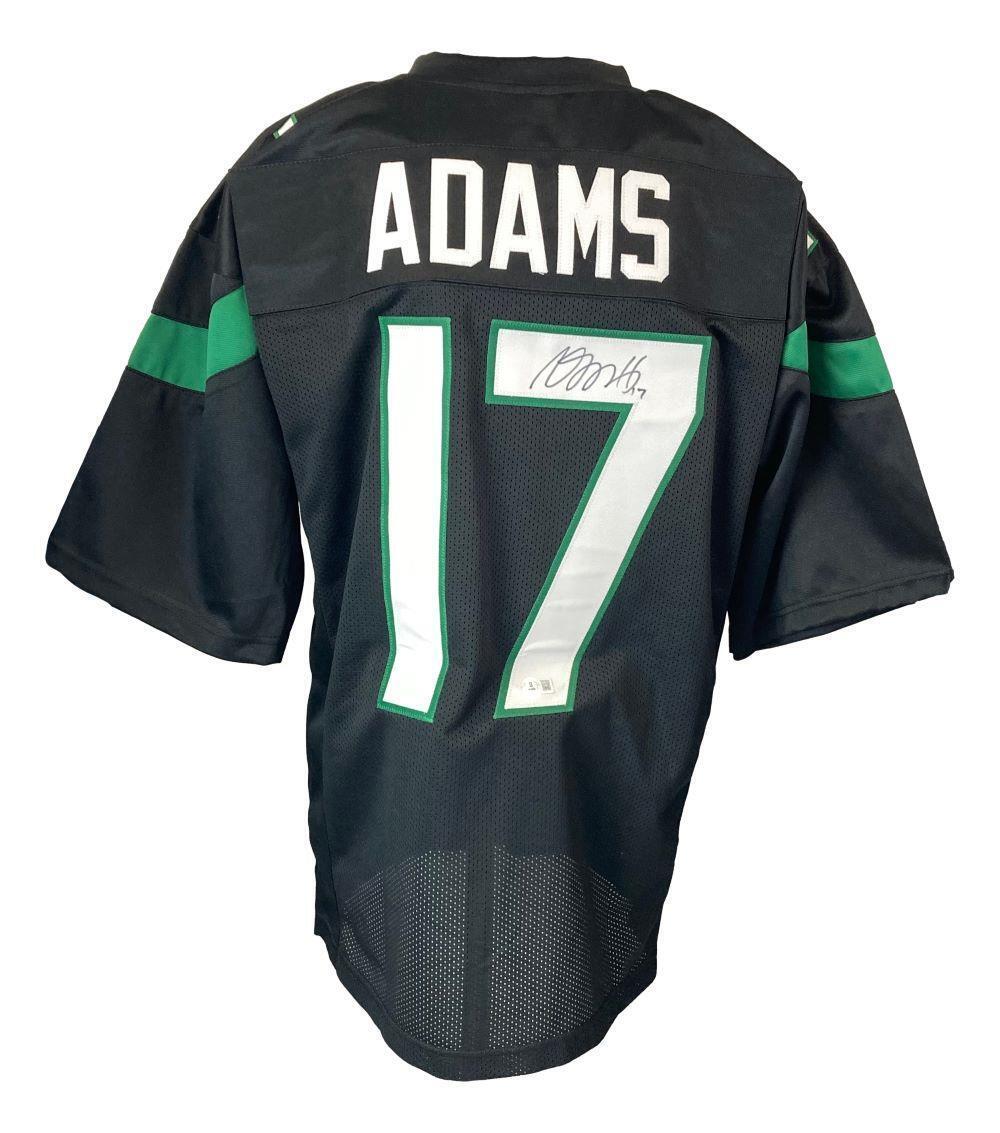 The Sports Integrity Davante Adams New York Signed Black Football Jersey BAS features "ADAMS" and number 17 in white and green on the back, marker-signed, with green and white sleeve accents.