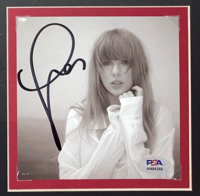 A Taylor Swift Framed White Football Jersey by Sports Integrity featuring a signed insert authenticated by PSA/DNA.