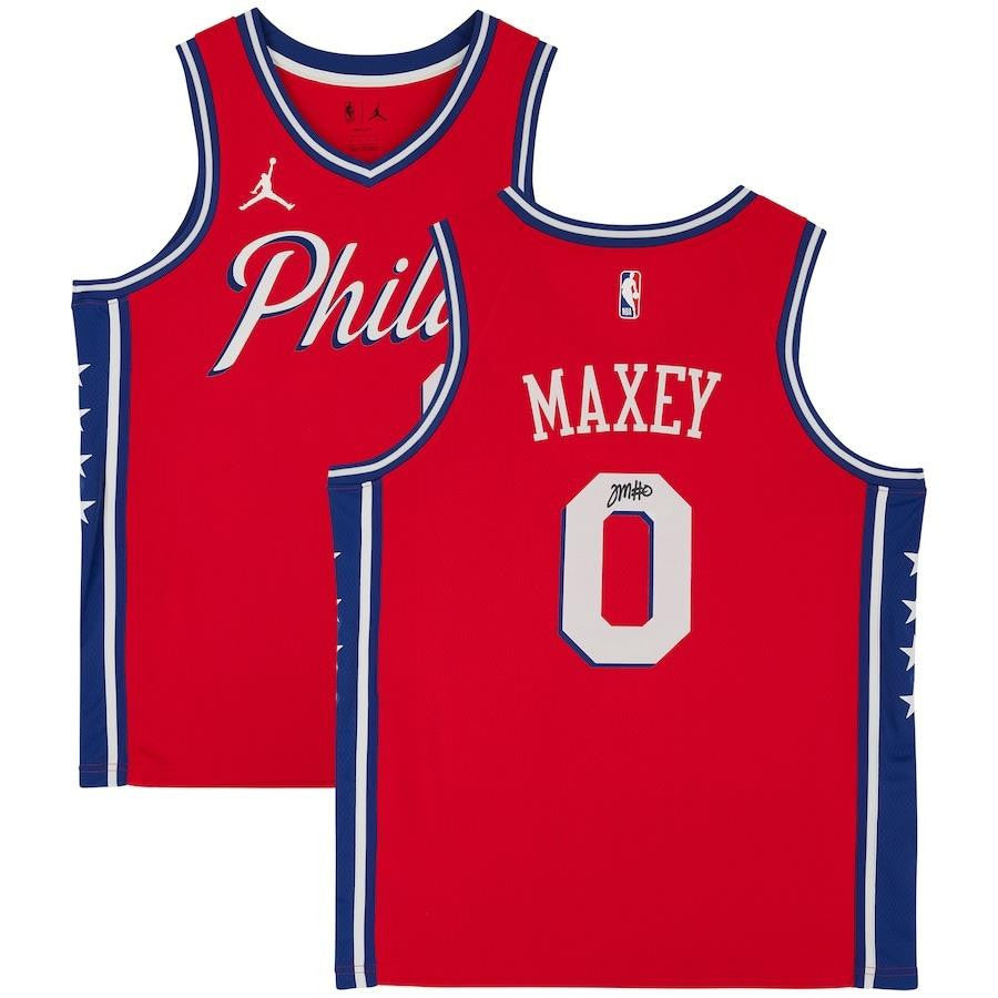 The Sports Integrity Tyrese Maxey Signed Philadelphia 76ers 2020-21 Jordan Brand Jersey by Fanatics is shown in red, with "Phila" and the Jordan logo on the front, and "Maxey," number 0, and his autograph on the back.