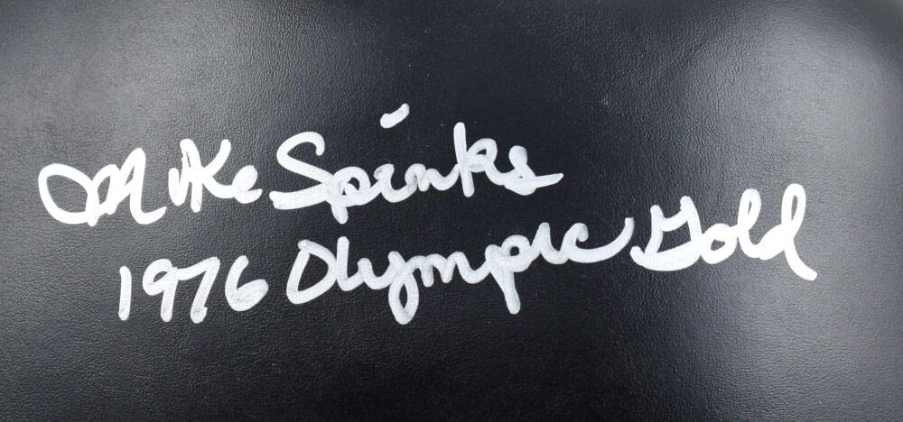 Michael Spinks Autographed Black Everlast Boxing Glove w/Gold- Beckett W Holo *R