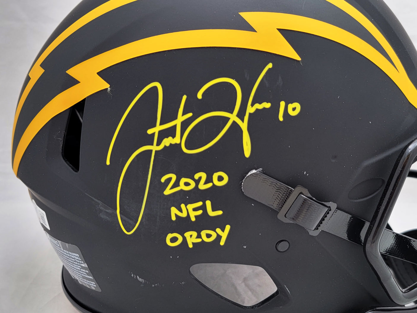 Justin Herbert Autographed Los Angeles Chargers Eclipse Black Full Size Authentic Speed Helmet "2020 NFL OROY" (Scuffed) Beckett BAS Witness Stock #206932