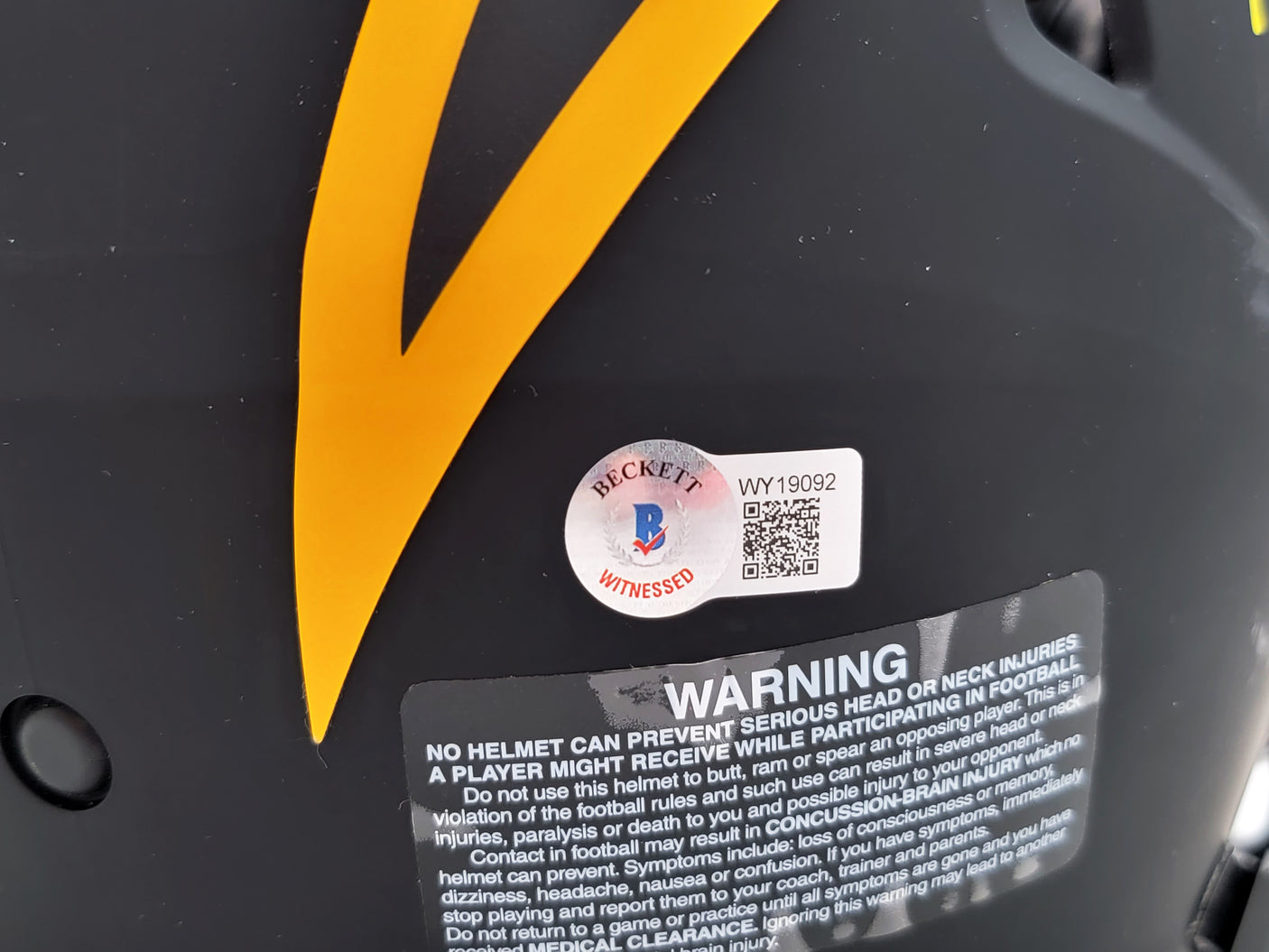 Justin Herbert Autographed Los Angeles Chargers Eclipse Black Full Size Authentic Speed Helmet "2020 NFL OROY" (Scuffed) Beckett BAS Witness Stock #206932