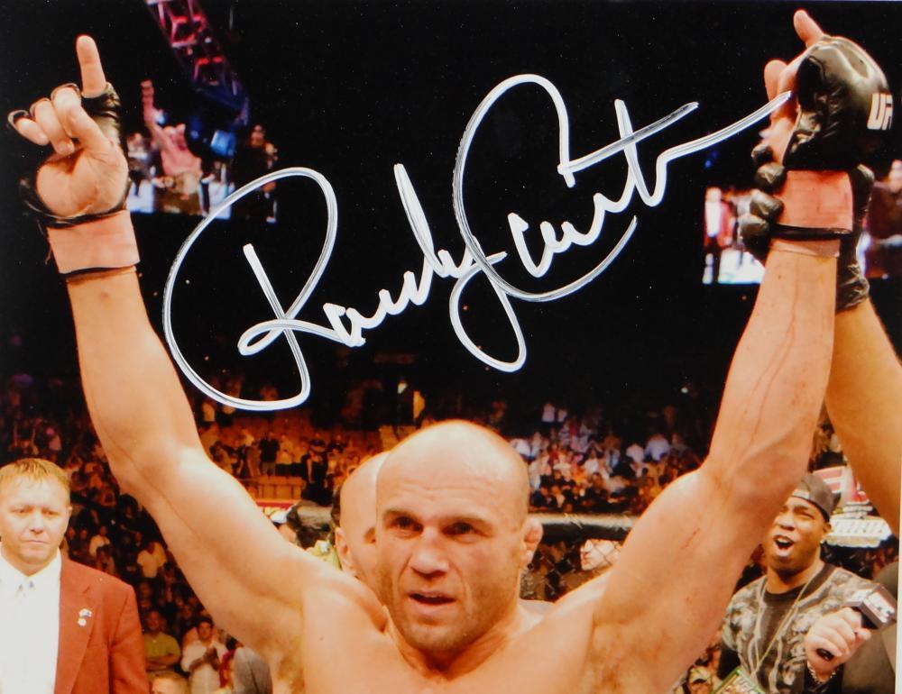 Randy Couture Autographed MMA 8x10 Photo With Belt- Beckett Auth *White