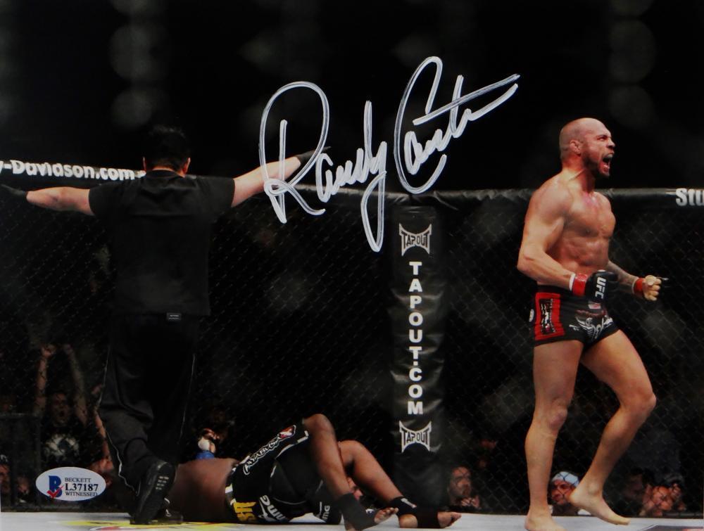 Randy Couture Signed MMA 8x10 Photo With Belt- Beckett Auth *Ref Back Turned