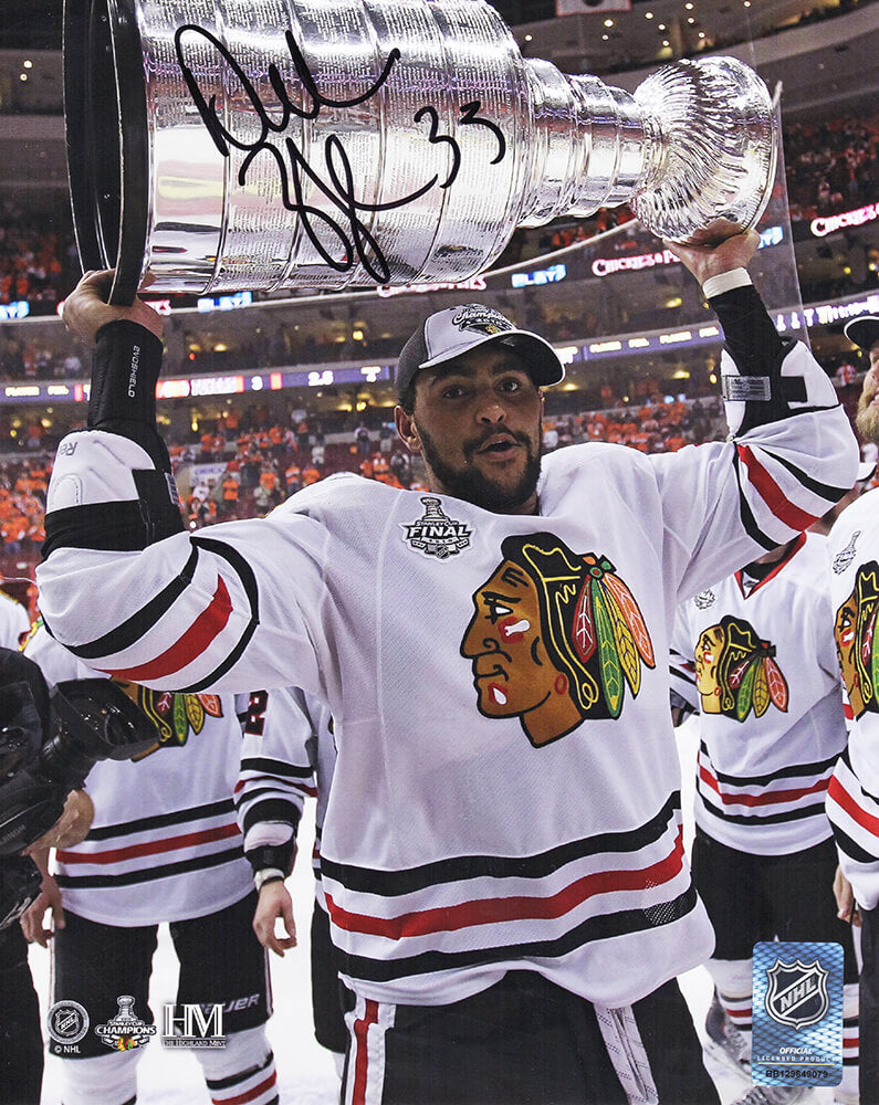 Dustin Byfuglien Signed Chicago Blackhawks 2010 Stanley Cup Holding Trophy 810 Photo