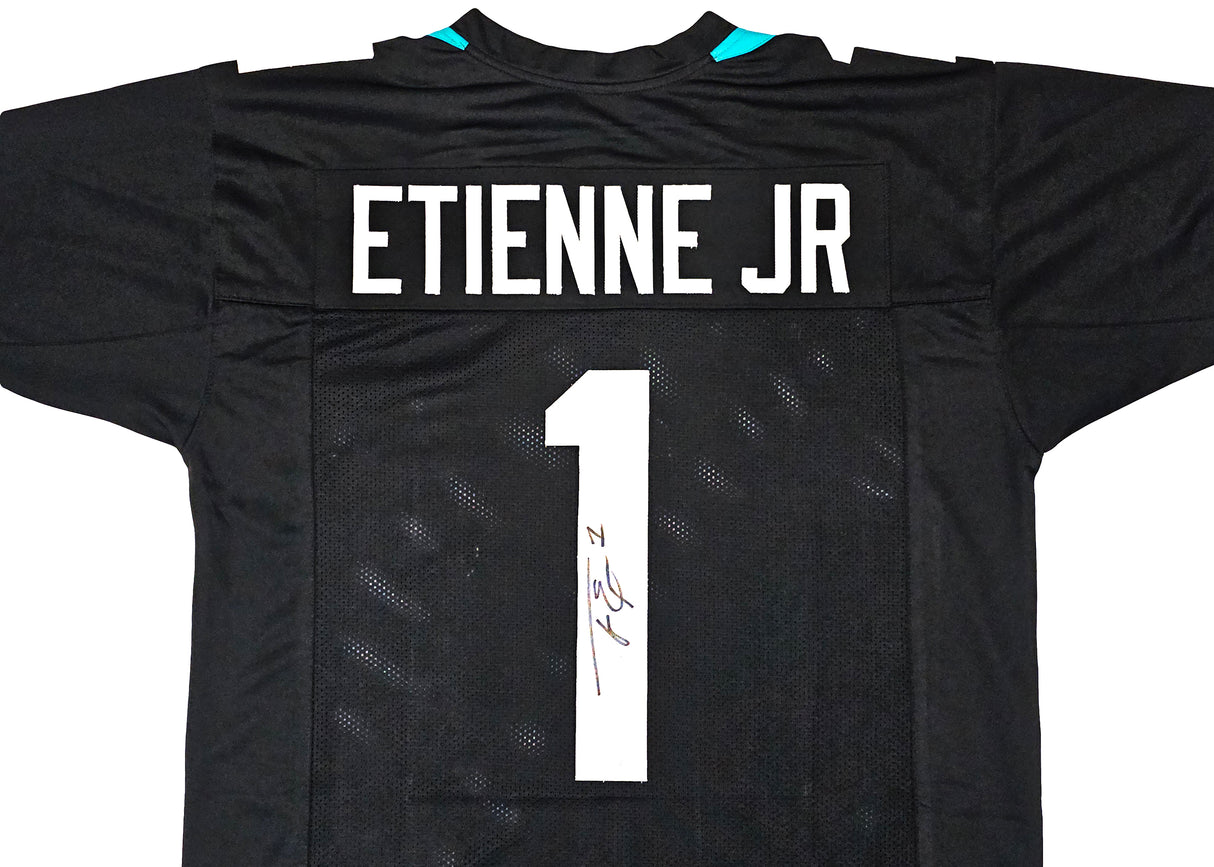 Jacksonville Jaguars Travis Etienne Autographed Black Jersey Beckett BAS Witness Stock #220898