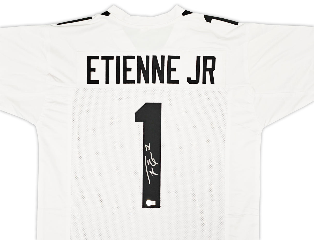 Jacksonville Jaguars Travis Etienne Autographed White Jersey Beckett BAS Witness Stock #220897