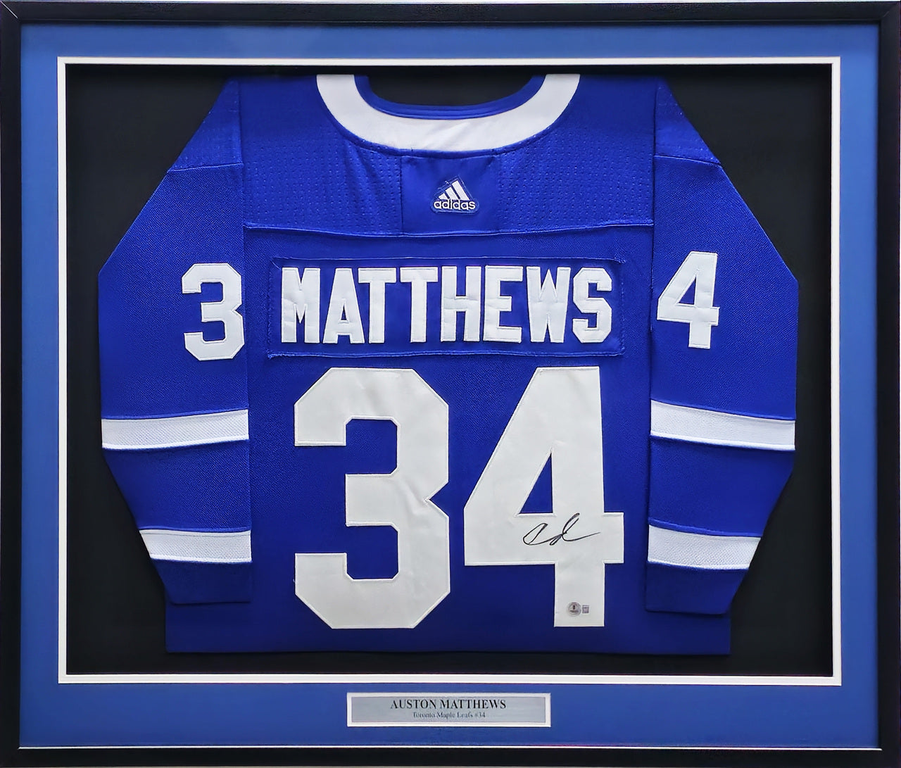 Toronto Maple Leafs Auston Matthews Autographed Framed Blue Adidas Authentic Jersey Beckett BAS QR #BN03413