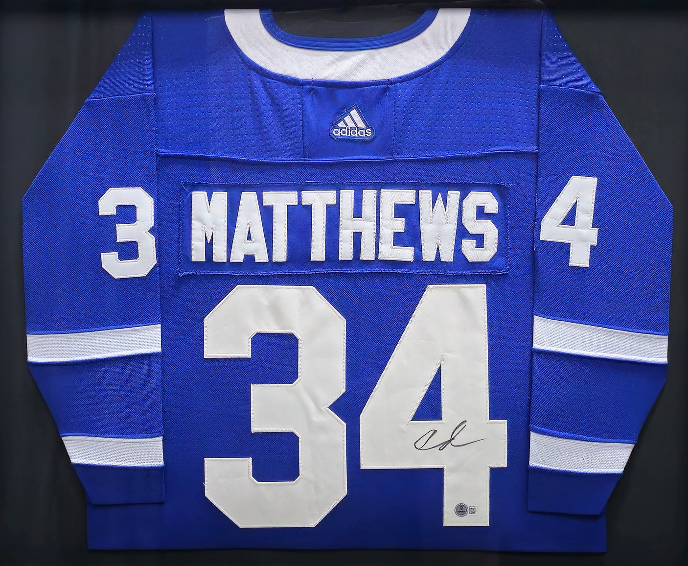 Toronto Maple Leafs Auston Matthews Autographed Framed Blue Adidas Authentic Jersey Beckett BAS QR #BN03413