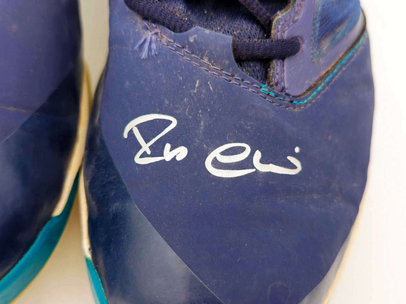 Robinson Cano Autographed Pair of Game Used Blue, Gold & Teal New Balance Revlite Cleats Seattle Mariners PSA/DNA #7A96537 & 7A96538