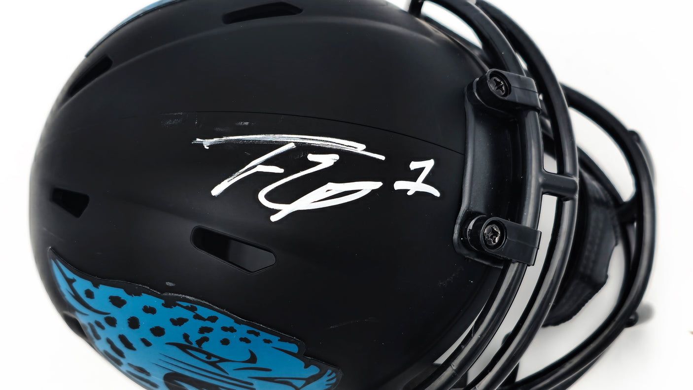 Travis Etienne Autographed Jacksonville Jaguars Eclipse Black Speed Mini Helmet Beckett BAS Witness Stock #225125