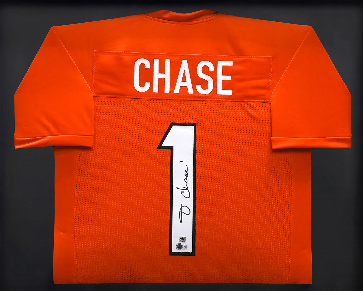 Cincinnati Bengals Ja'Marr Chase Autographed Framed Orange Jersey Beckett BAS Witness Stock #239062