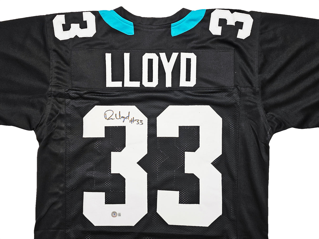 Jacksonville Jaguars Devin Lloyd Autographed Black Jersey Beckett BAS Witness Stock #215005