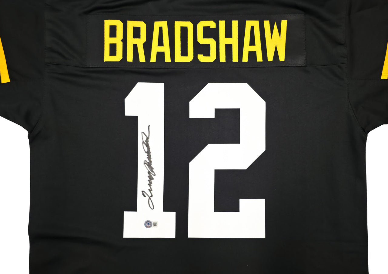 Pittsburgh Steelers Terry Bradshaw Autographed Black Jersey Beckett BAS Witness Stock #239866