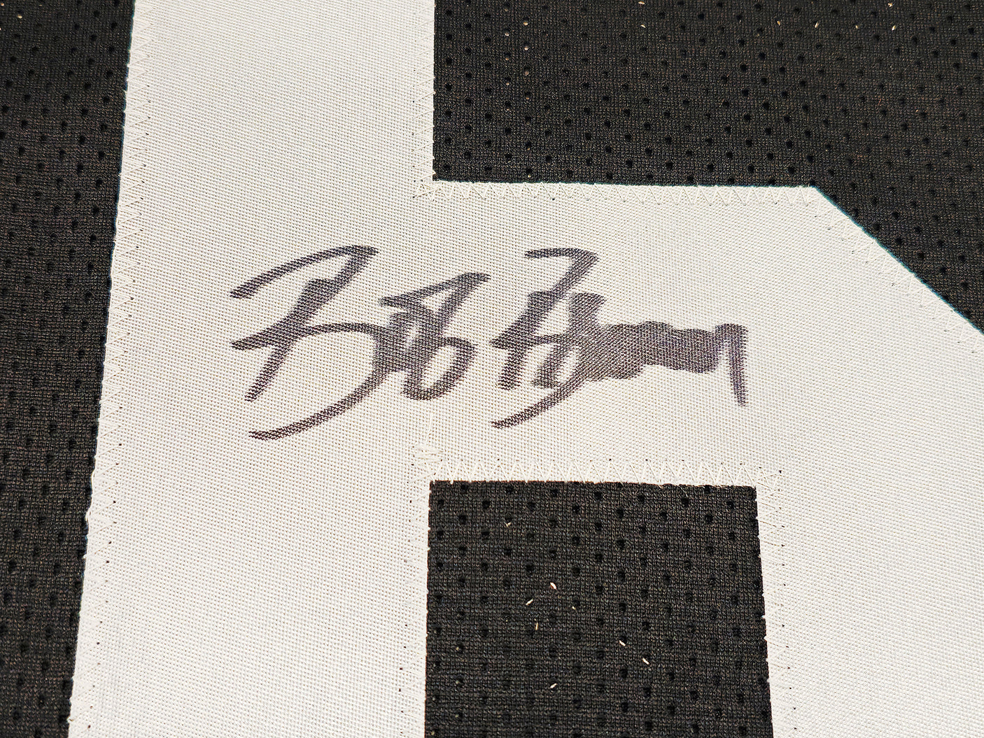 Oakland Raiders Bob Brown Autographed Black Jersey "HOF 04" Beckett BAS QR Stock #229533