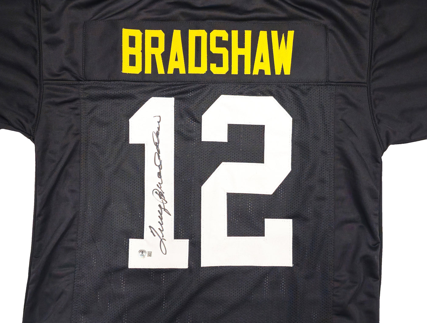 Pittsburgh Steelers Terry Bradshaw Autographed Black Jersey Beckett BAS Witness Stock #230649