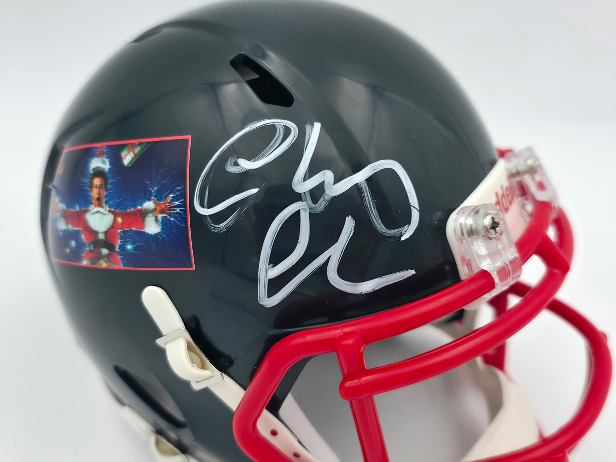 Chevy Chase Autographed Christmas Vacation Black Speed Mini Helmet Beckett BAS QR #AD34290