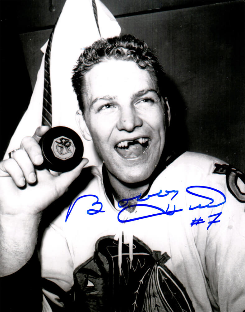 Bobby Hull Signed Blackhawks B&W Holding 1st 50th Goal Puck 8x10 Photo