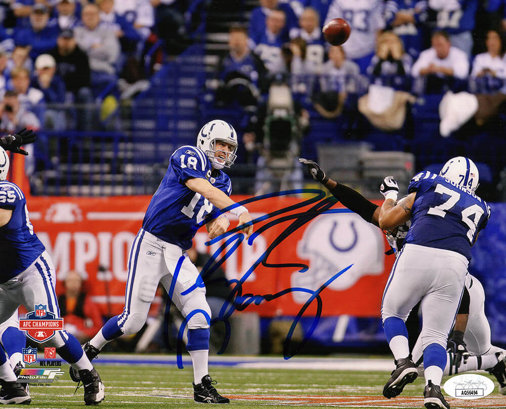 Peyton Manning Signed Indianapolis Colts Blue Jersey Passing Action 8x10 Photo- (JSA)