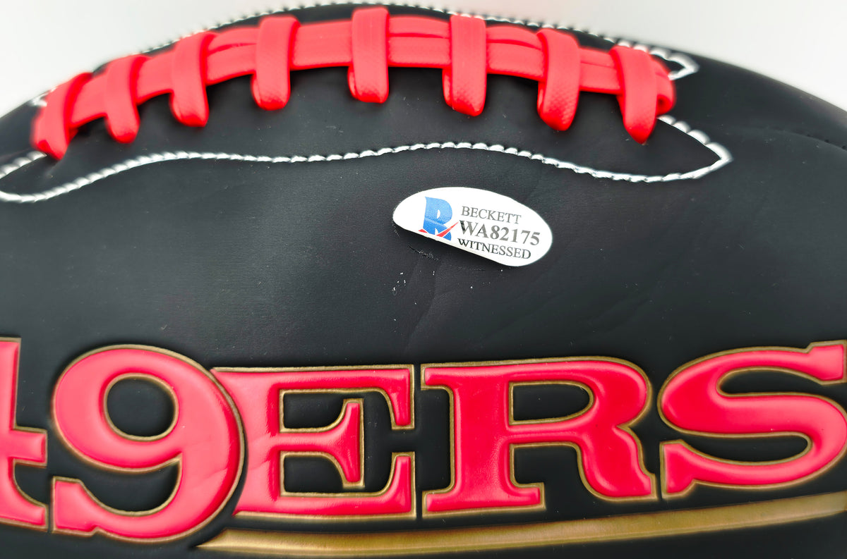 Joe Montana Autographed Official Rawlings Black Football San Francisco 49ers (Flat, Smudged) Beckett BAS #WA82175