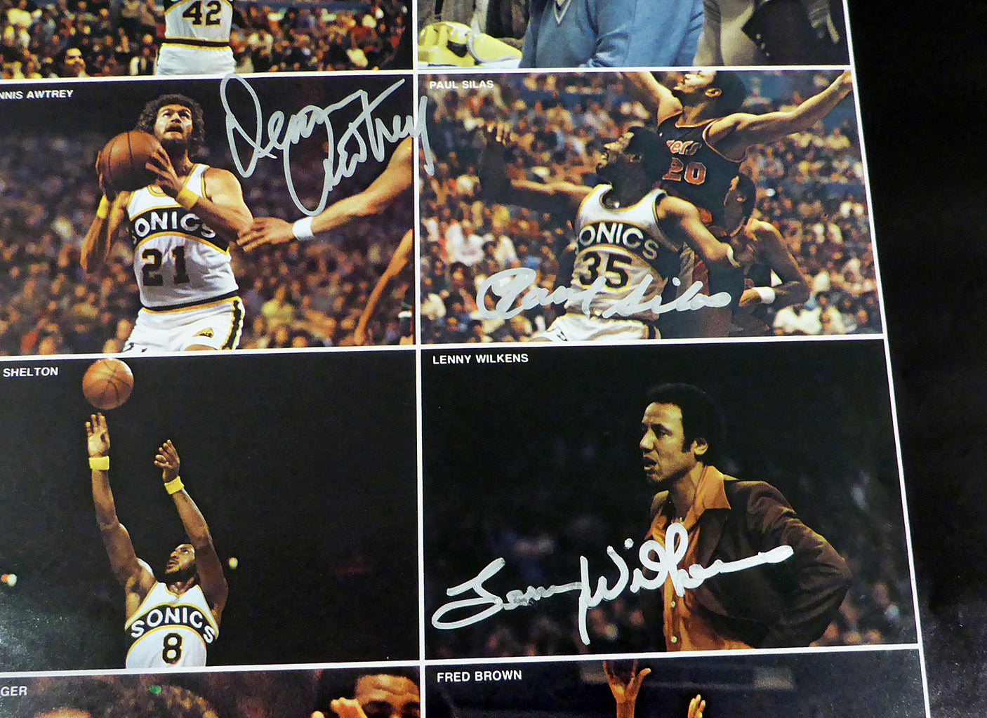 1978-79 NBA Champions Seattle Supersonics Autographed 17x22 Poster Photo With 9 Total Signatures Including Fred Brown & Lenny Wilkens MCS Holo #51050
