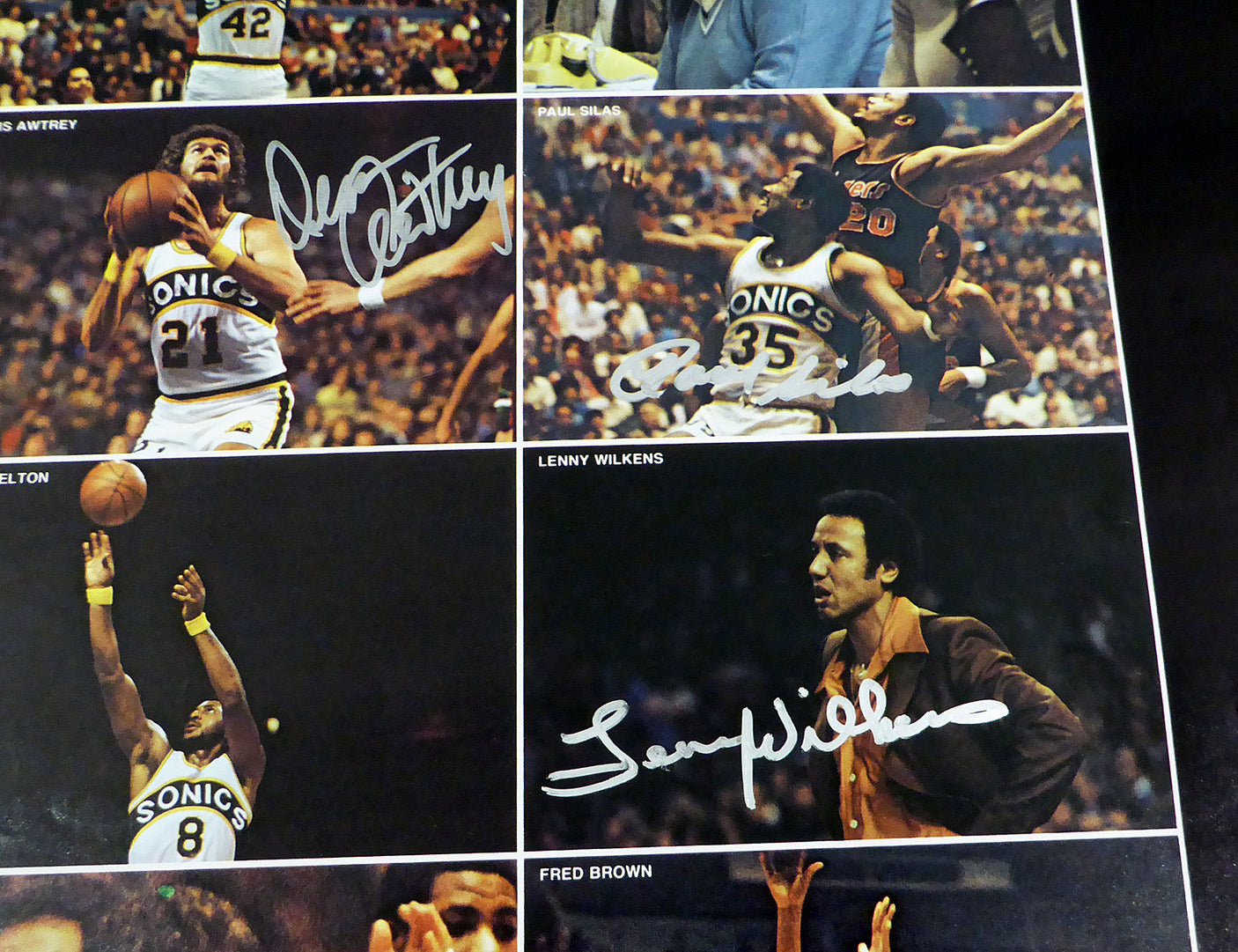 1978-79 NBA Champions Seattle Supersonics Autographed 17x22 Poster Photo With 9 Total Signatures Including Fred Brown & Lenny Wilkens MCS Holo #51049