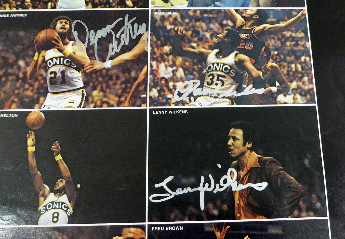 1978-79 NBA Champions Seattle Supersonics Autographed 17x22 Poster Photo With 9 Total Signatures Including Fred Brown & Lenny Wilkens MCS Holo #51048