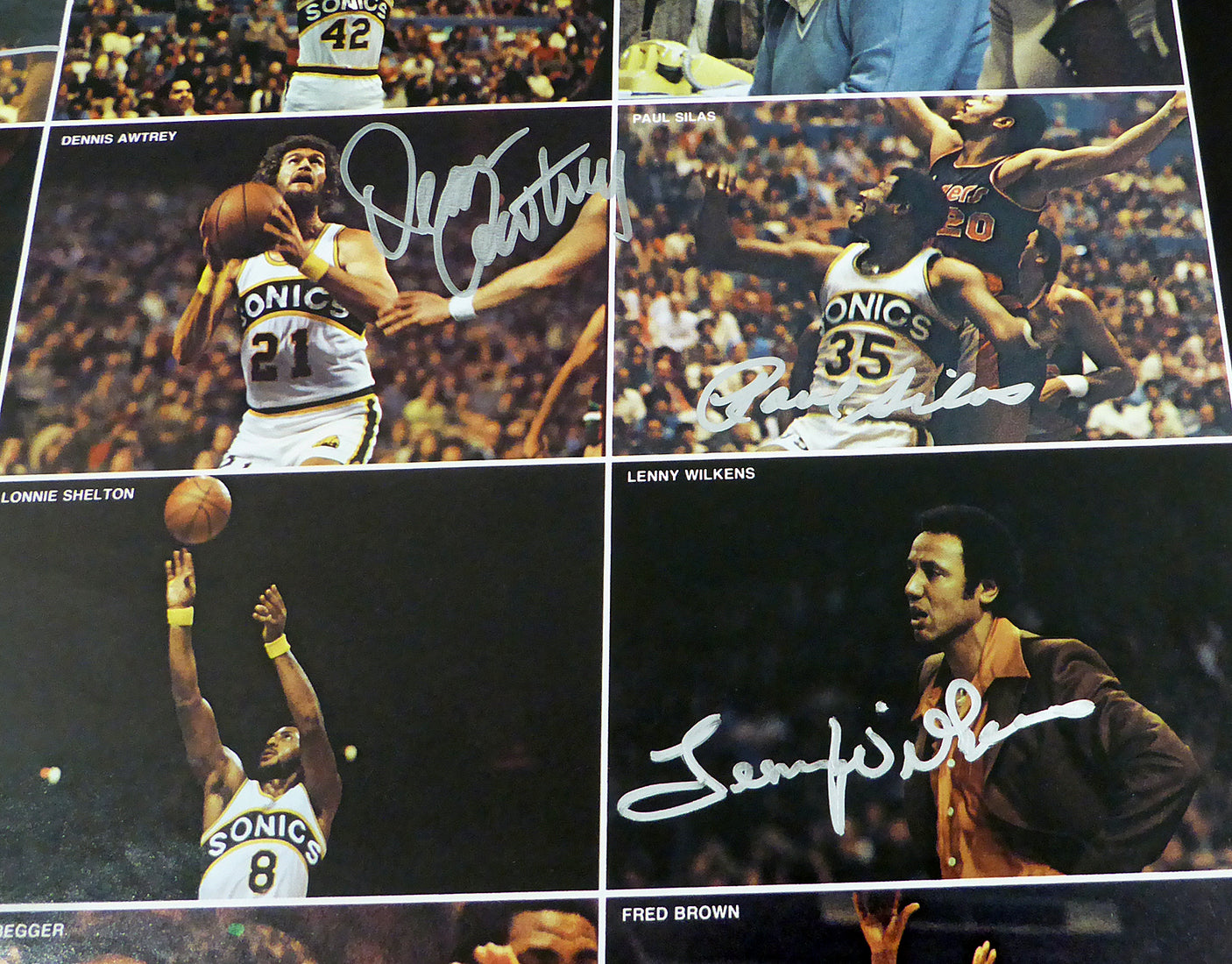 1978-79 NBA Champions Seattle Supersonics Autographed 17x22 Poster Photo With 9 Total Signatures Including Fred Brown & Lenny Wilkens MCS Holo #51047