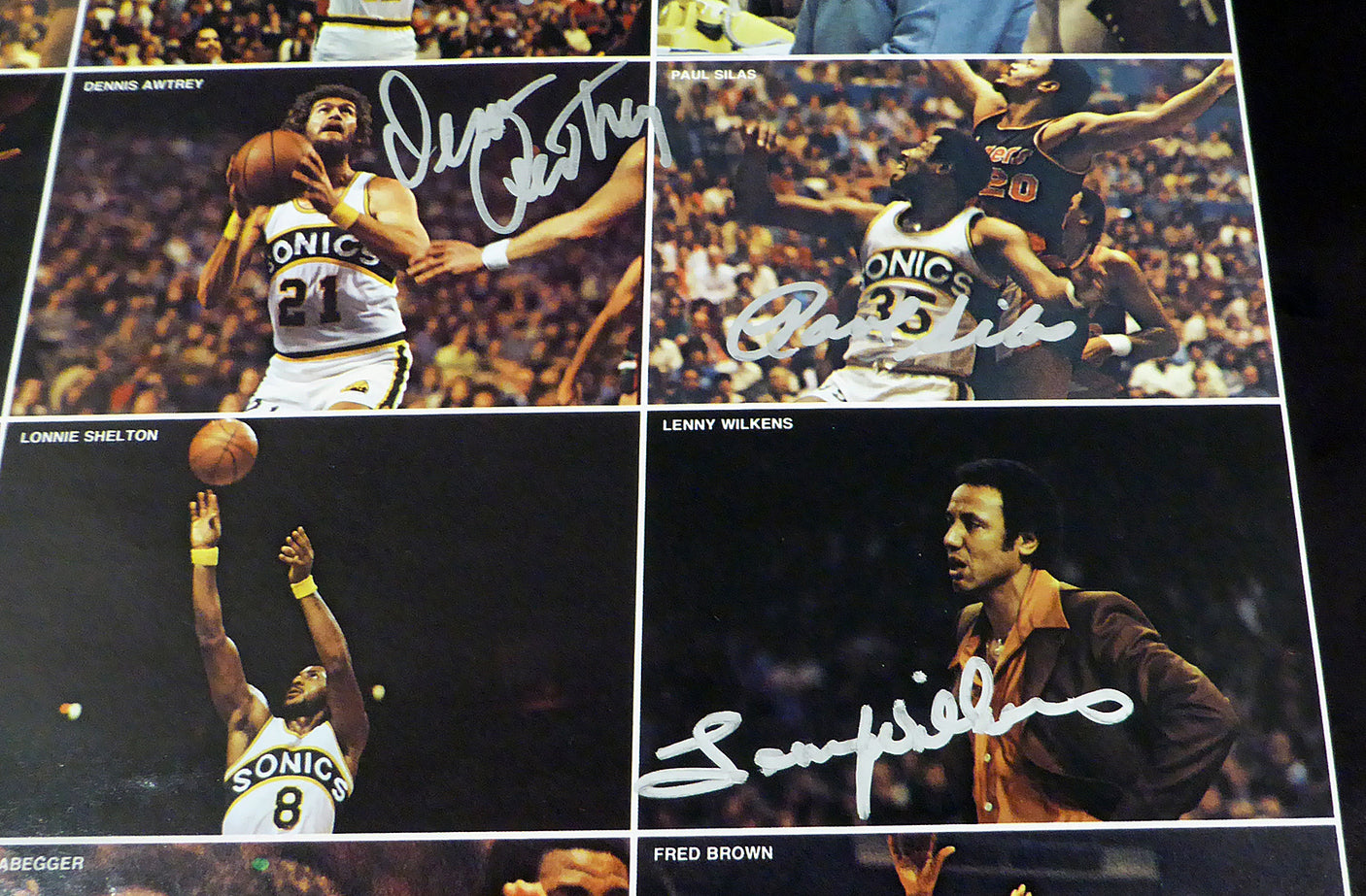 1978-79 NBA Champions Seattle Supersonics Autographed 17x22 Poster Photo With 9 Total Signatures Including Fred Brown & Lenny Wilkens MCS Holo #51046