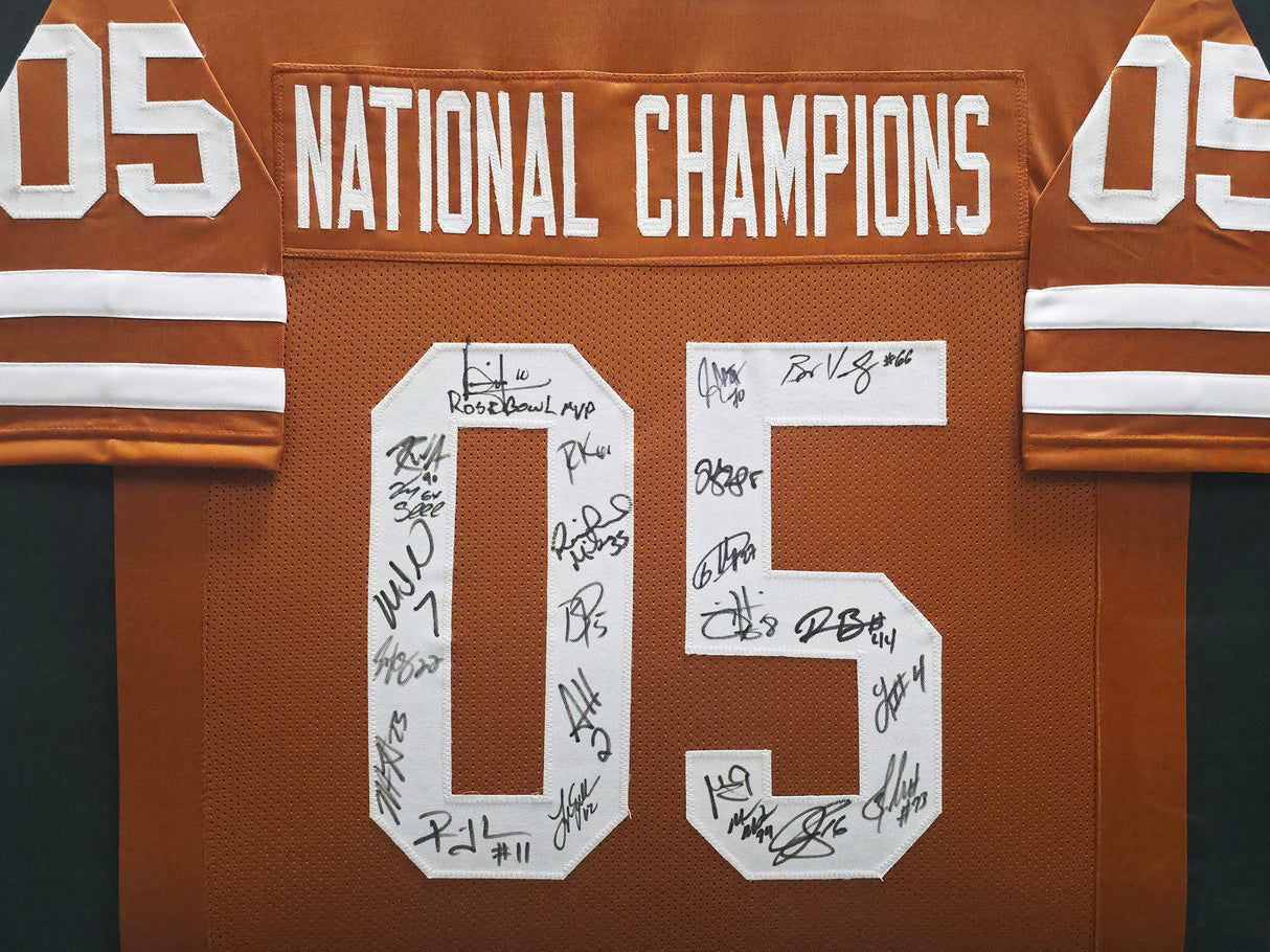 2005 National Champions Texas Longhorns Autographed Framed Orange Jersey With 24 Signatures Including Vince Young Beckett BAS QR Stock #252809