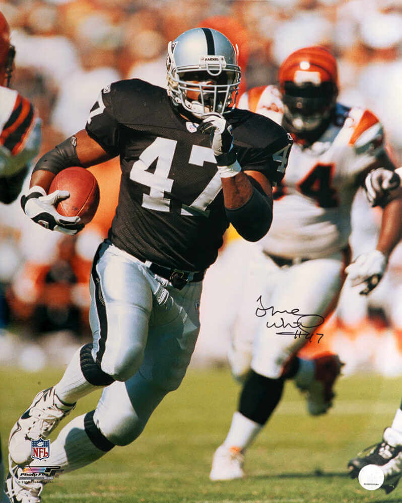 Tyrone Wheatley Signed Raiders Black Jersey Action 16x20 Photo