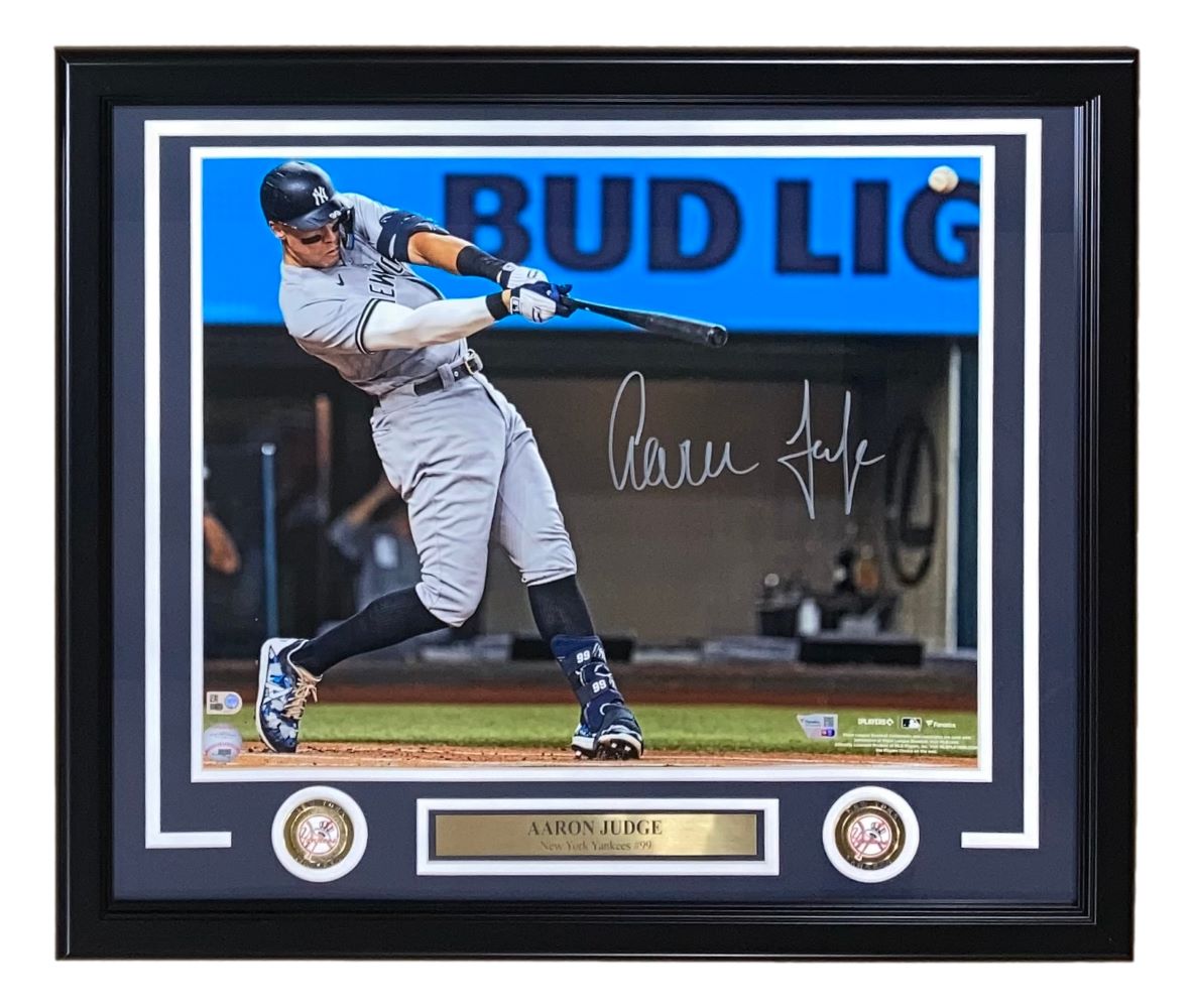 The Aaron Judge Signed Framed 16x20 New York Yankees Home Run 62 Photo by Sports Integrity features Judge swinging a bat, two medallions, and a nameplate reading AARON JUDGE, with a Bud Light sign visible in the background.
