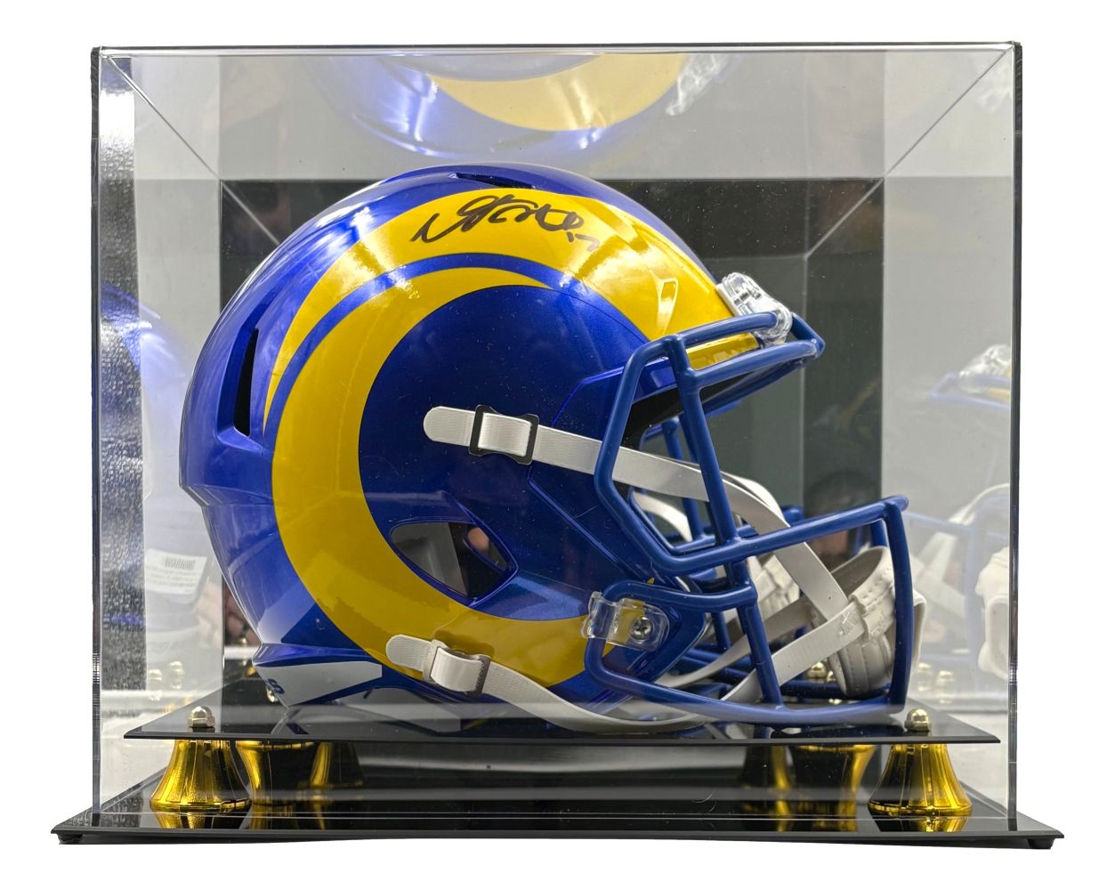 A Davante Adams signed Los Angeles Rams full-size replica speed helmet by Sports Integrity, displayed in a clear acrylic case with a black and gold base.