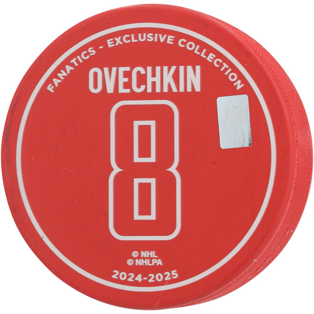 This Sports Integrity Alexander Ovechkin Signed Washington Capitals Red Goal 895 Logo Puck features his name, number 8 in white, "Fanatics - Exclusive Collection," "2024-2025," and visible NHL/NHLPA logos.