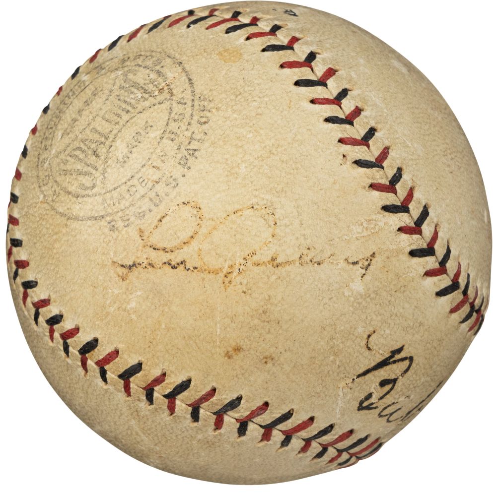 The Sports Integrity Babe Ruth Lou Gehrig Yankees 1920s Signed Spalding NL Baseball features visible red stitching, faded text, and black ink signatures, showing signs of use and age. BAS+PSA LOA included.