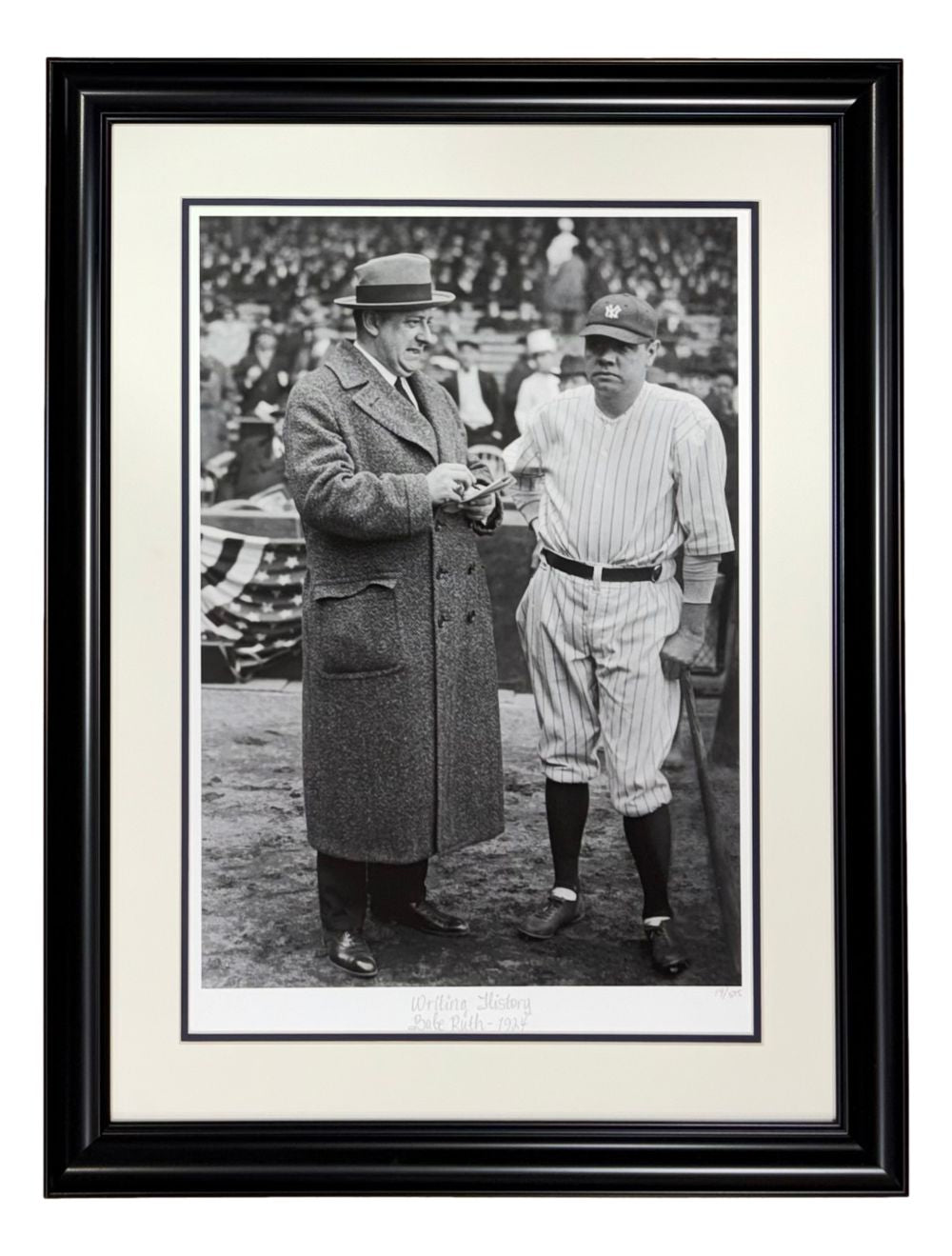 The Sports Integrity "Babe Ruth New York Yankees Framed Writing History Historical Archive Giclee 2" features a black and white photo of two men—one in a coat and one in a pinstripe uniform—at a baseball field with a crowd in the background.
