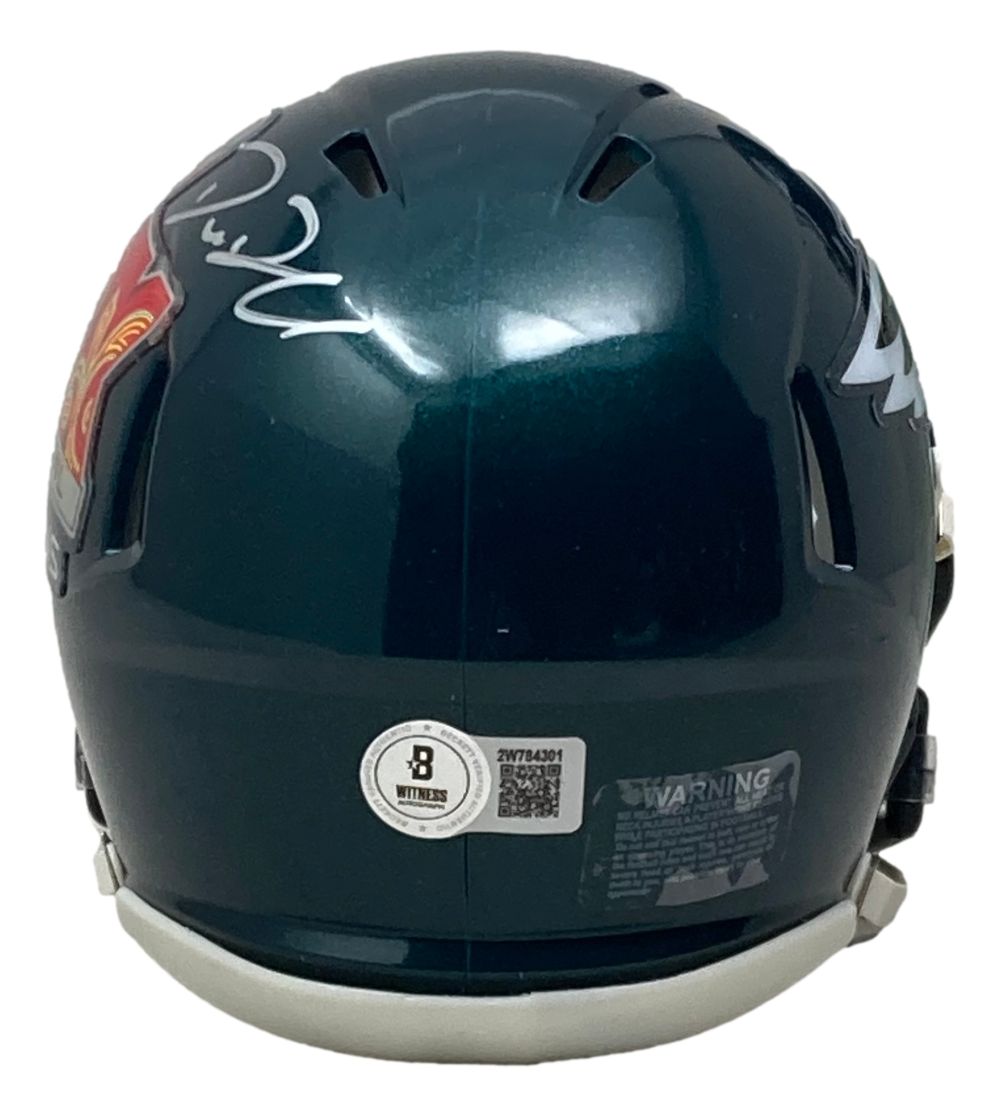 The Sports Integrity Big Dom DiSandro Signed Philadelphia Eagles Super Bowl 59 LIX Mini Speed Helmet BAS is dark green, seen from the back, with a white autograph on top, team logo on the side, certification sticker, and warning label.